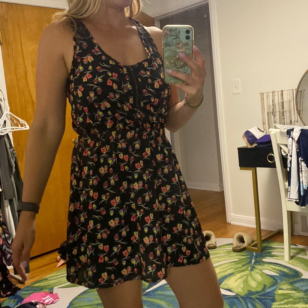 Mid thigh racer back dress with half zip front and lace straps. Owl pattern